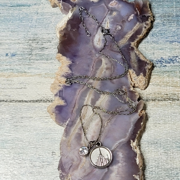 Elegant Silver Necklace with Temple Medallion Pendant